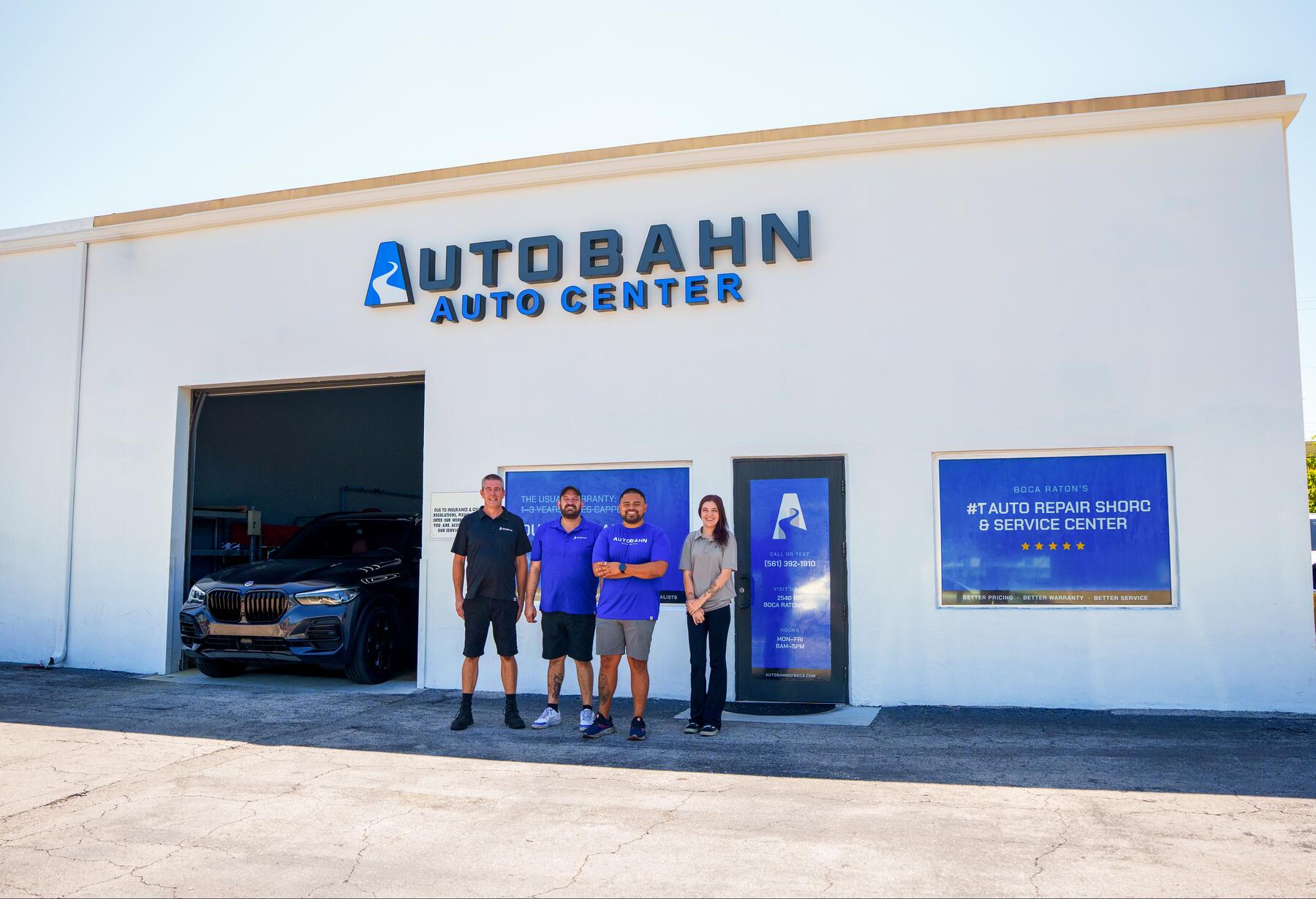 The Autobahn Auto Center team outside the shop in Boca Raton