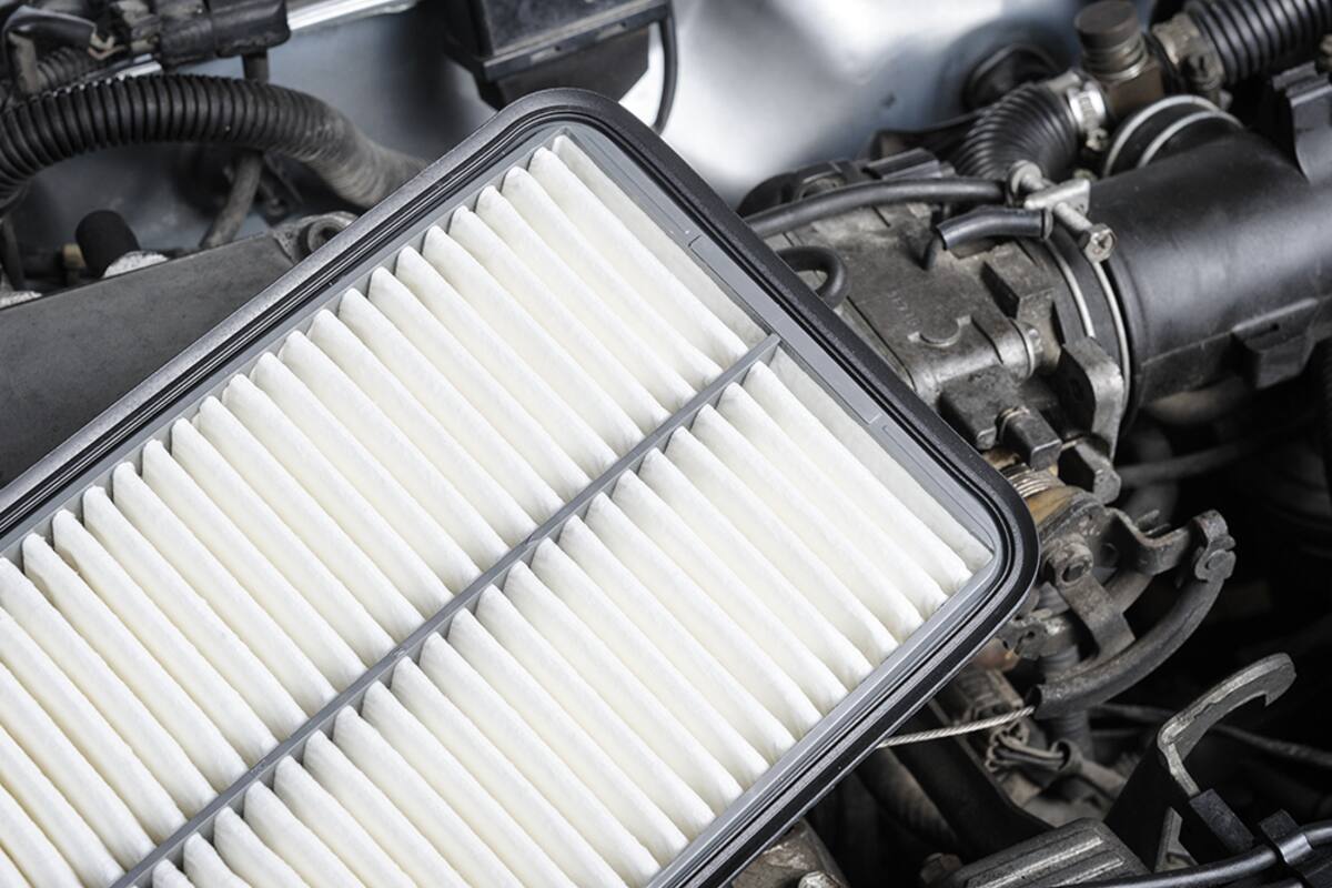 Engine air filter in its housing