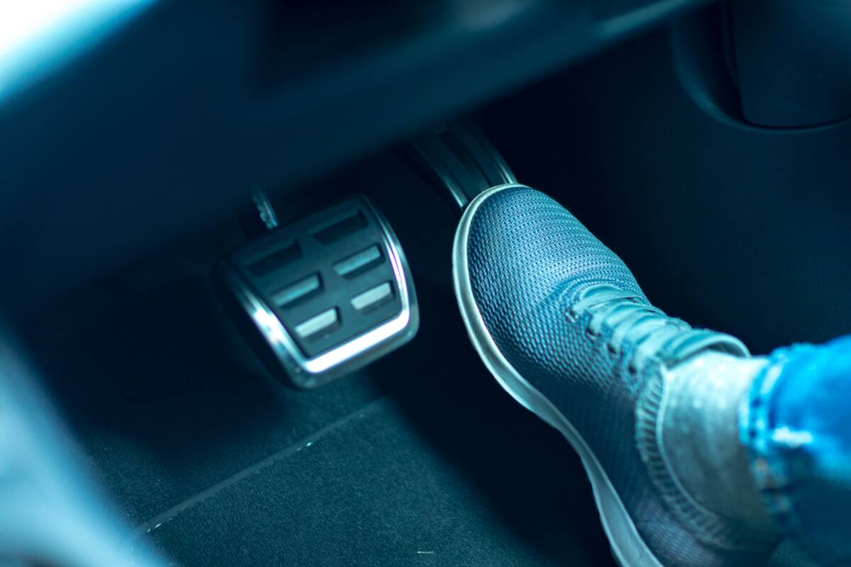 Driver's foot on the accelerator pedal