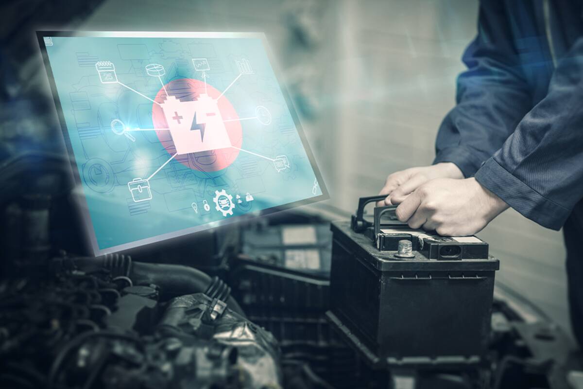 Car battery connected to diagnostic equipment