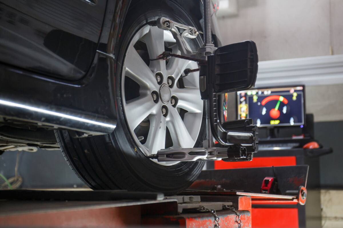 Car on a wheel alignment rig