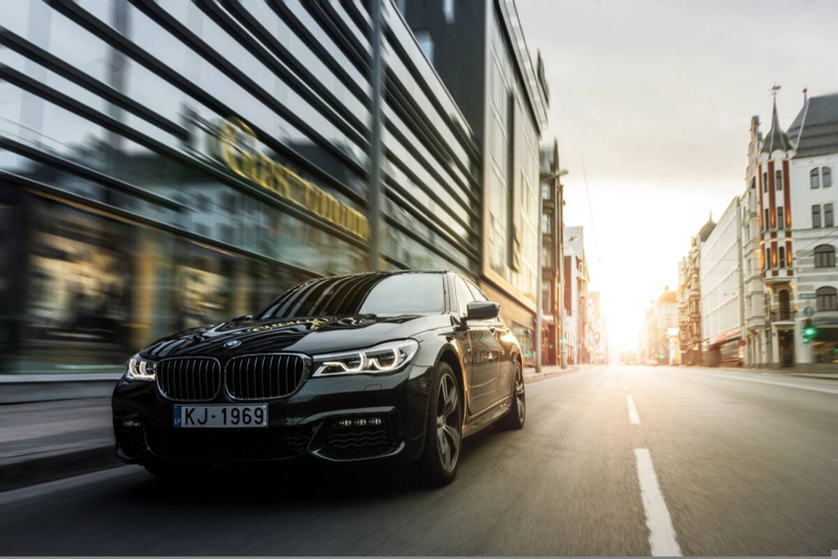 Black BMW on a city road