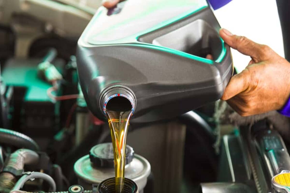 Engine oil being poured from a bottle