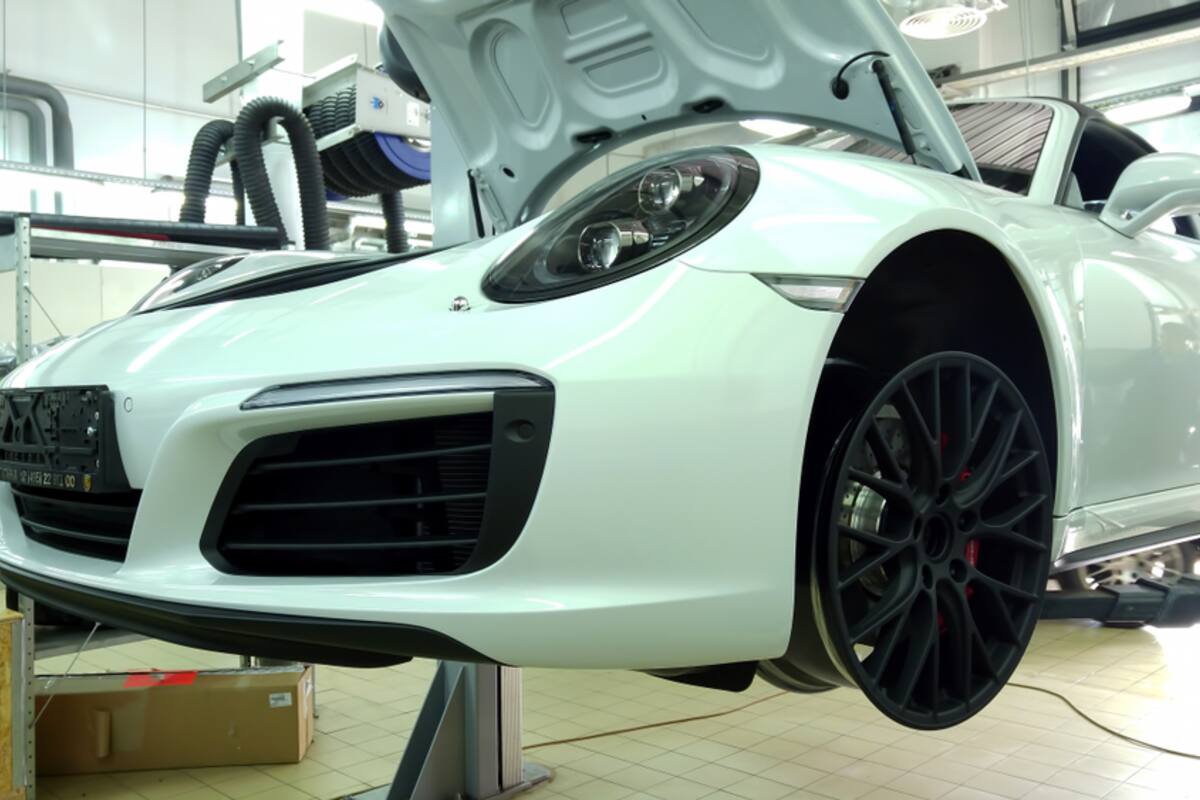 White Porsche 911 in a workshop