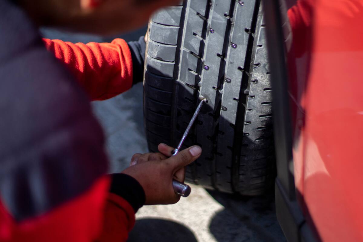 Checking the tread on a tire