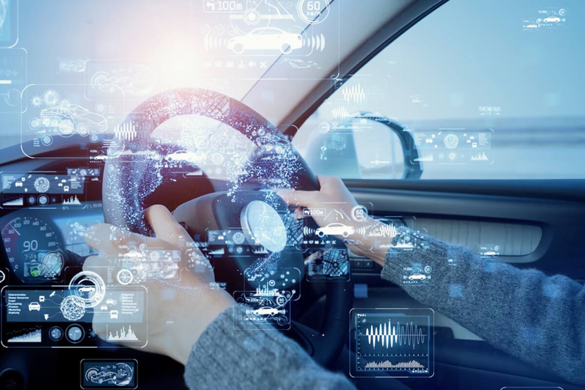 Driver at the wheel with a digital data overlay