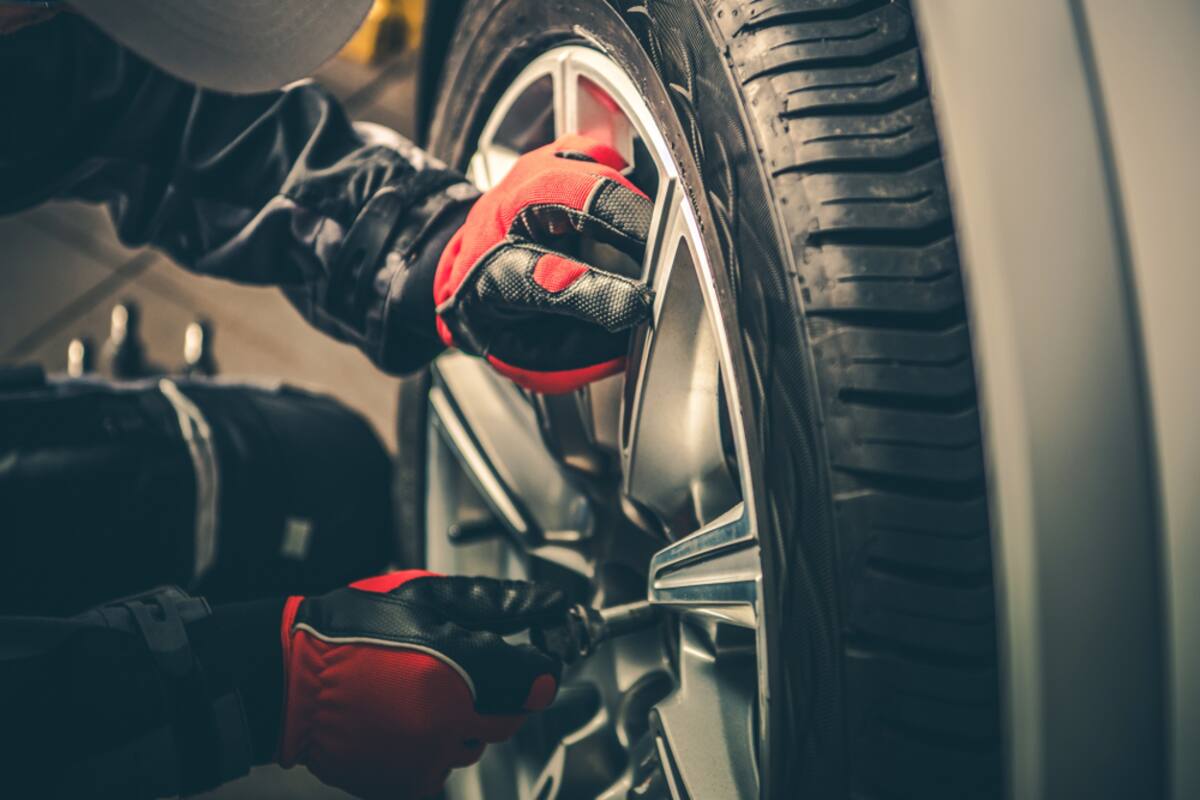 Brake caliper behind a wheel