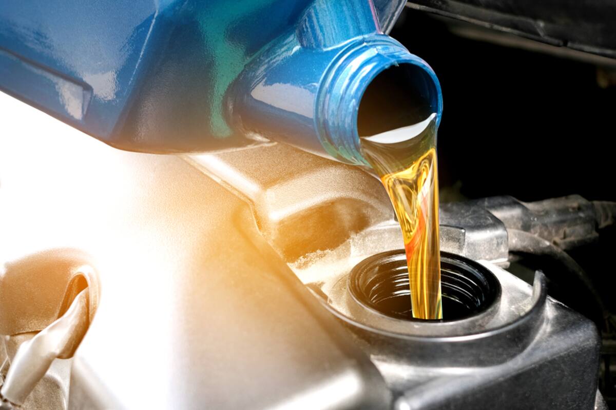 Engine oil being poured into an engine