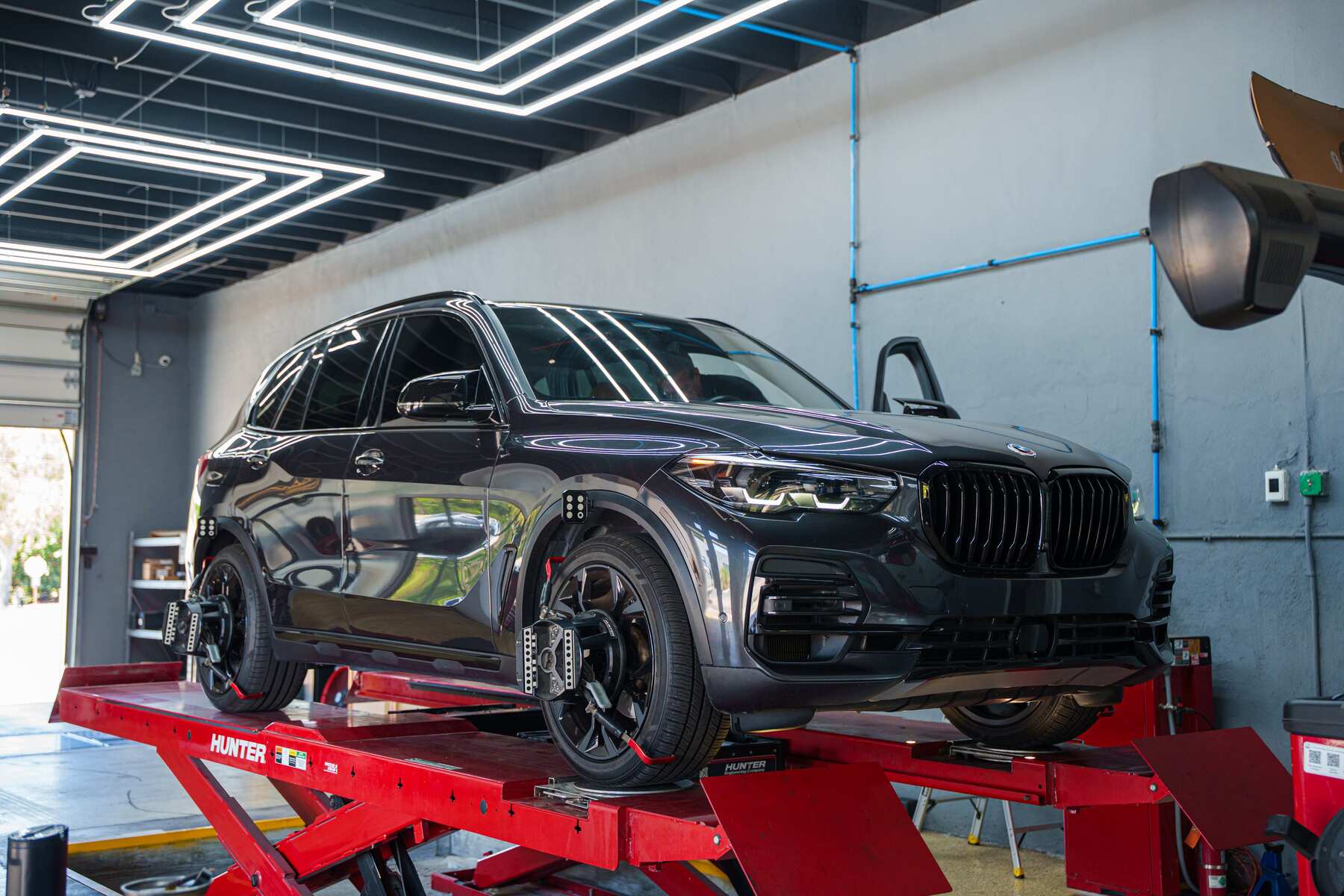 BMW raised on a lift in the Autobahn workshop