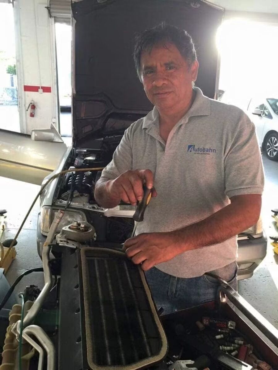 Julio Osorto, founder of Autobahn Auto Center and a master technician, at work in the shop